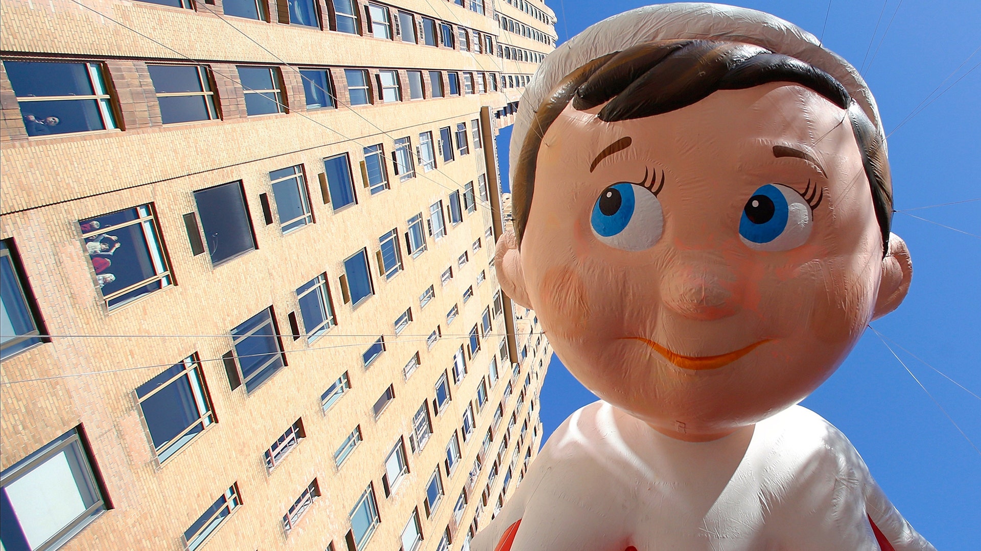 The Elf on a Shelf balloon floats down Central Park West during the Macy's Thanksgiving Day Parade in New York City, Nov. 22, 2018.