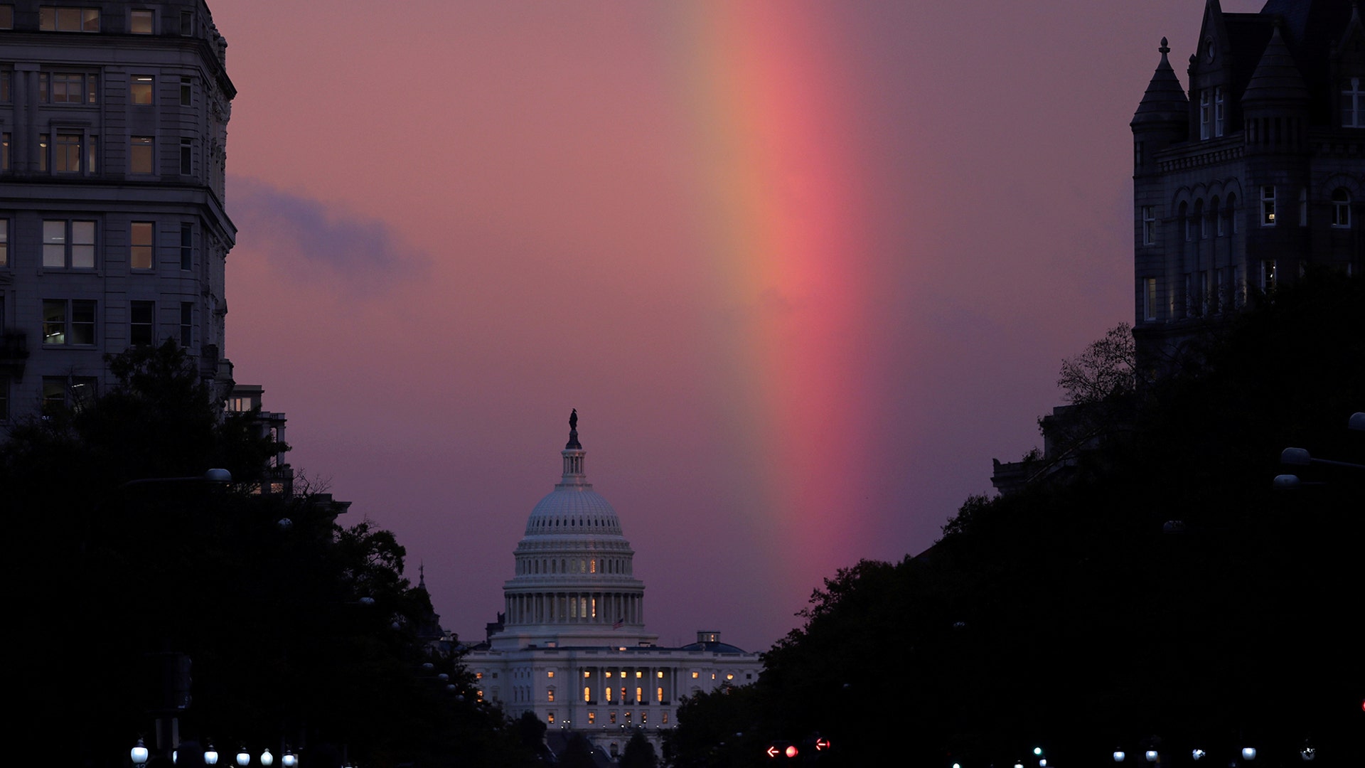 A rainbow forms over the U.S. Capitol as evening sets on midterm Election Day in Washington, November 6, 2018.