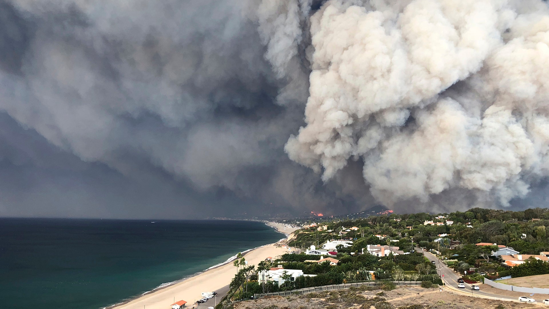 Smoke from a wildfire fills the air in Malibu, California, November 10, 2018.  