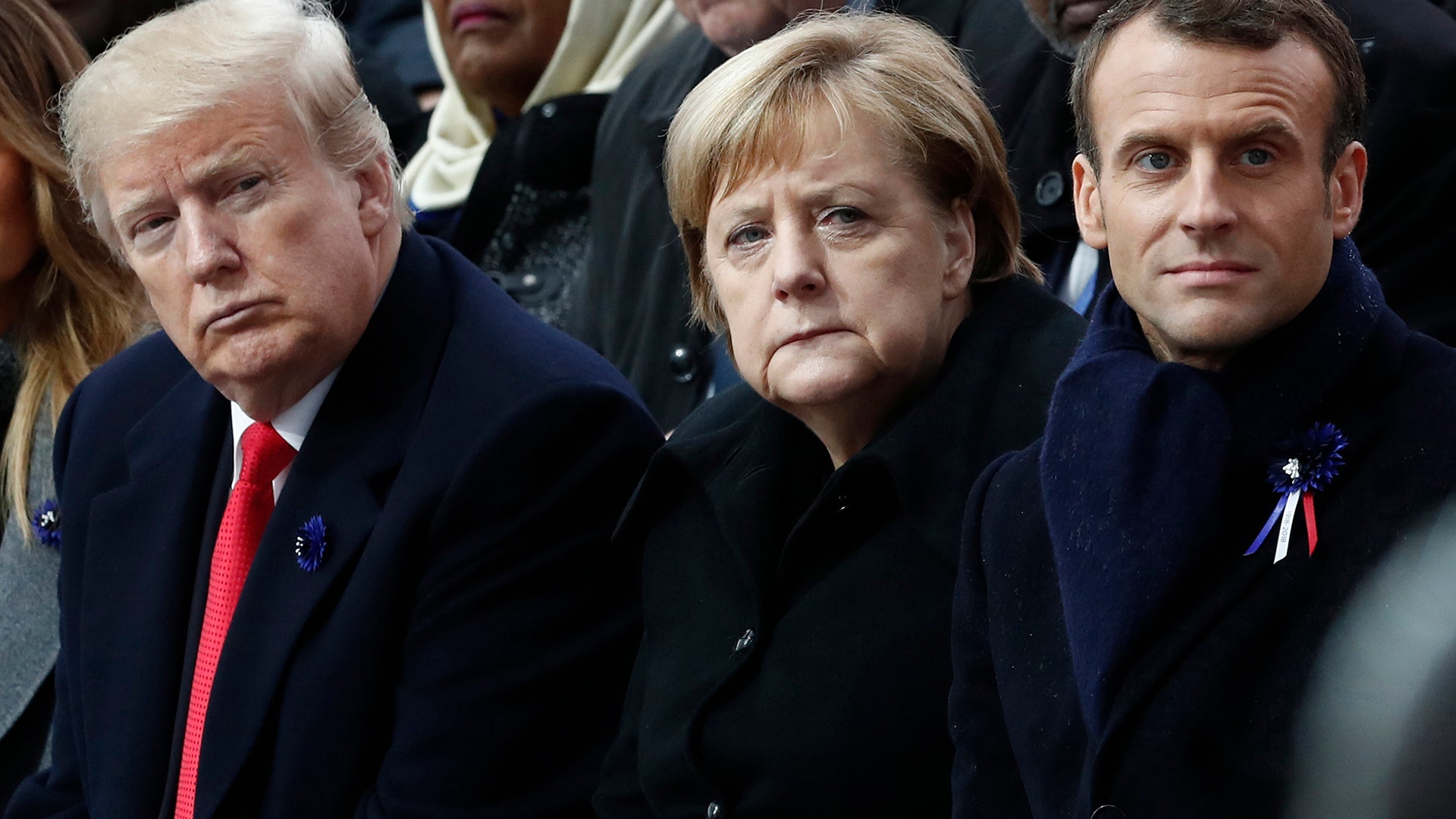 French President Emmanuel Macron, German Chancellor Angela Merkel and President Donald Trump attend a commemoration ceremony for Armistice Day, 100 years after the end of the First World War at the Arc de Triomphe in Paris, November 11, 2018. 