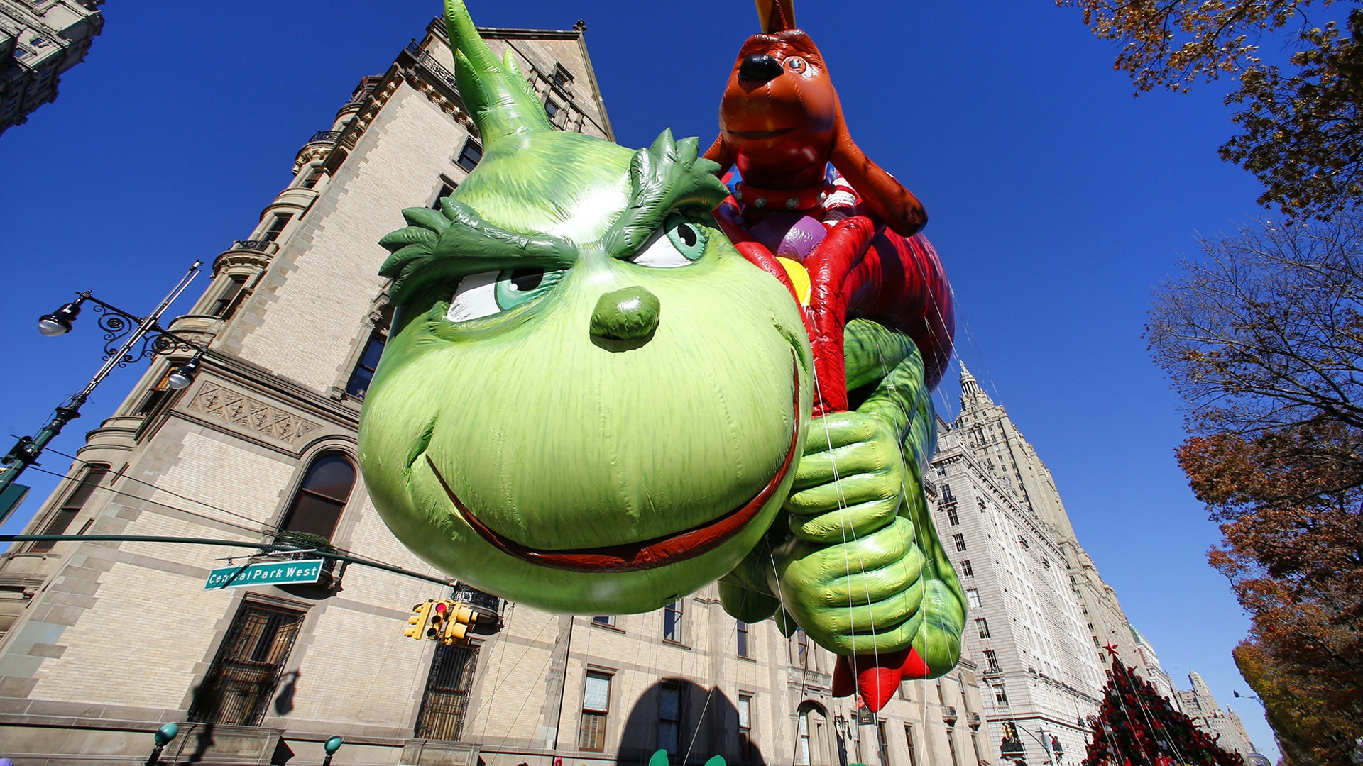 The Grinch balloon floats down Central Park West during the Macy's Thanksgiving Day Parade in New York City, Nov. 22, 2018.
