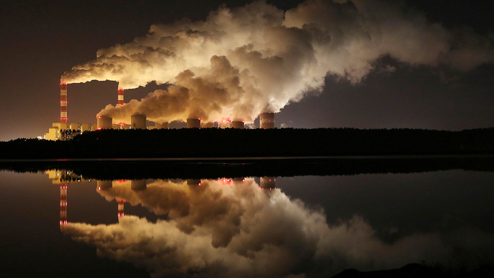 Clouds of smoke billow over Europe's largest lignite power plant in Belchatow, central Poland, Nov. 28, 2018. 