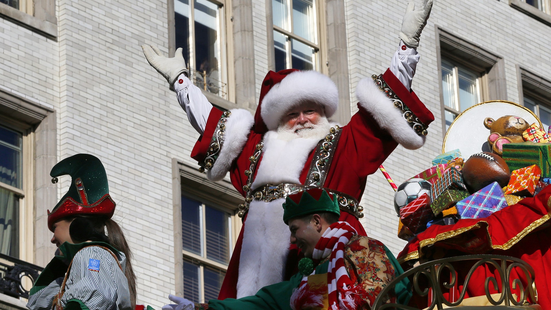 Santa Claus waves from his float as it proceeds down Central Park West during the Macy's Thanksgiving Day Parade in New York City, Nov. 22, 2018.