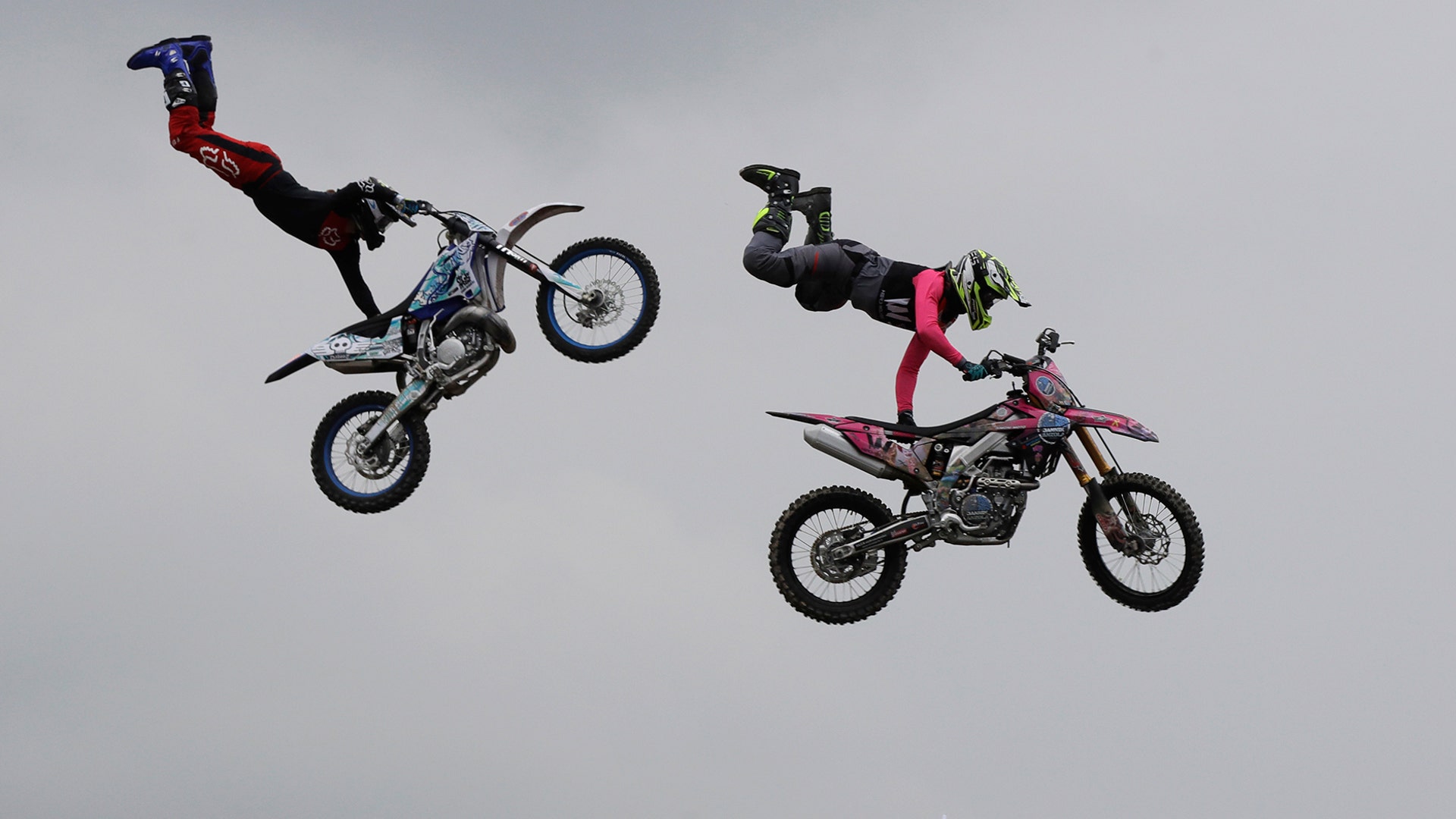 Riders perform during a freestyle motocross show at the EICMA exhibition motorcycle fair in Milan, Italy, November 8, 2018. 