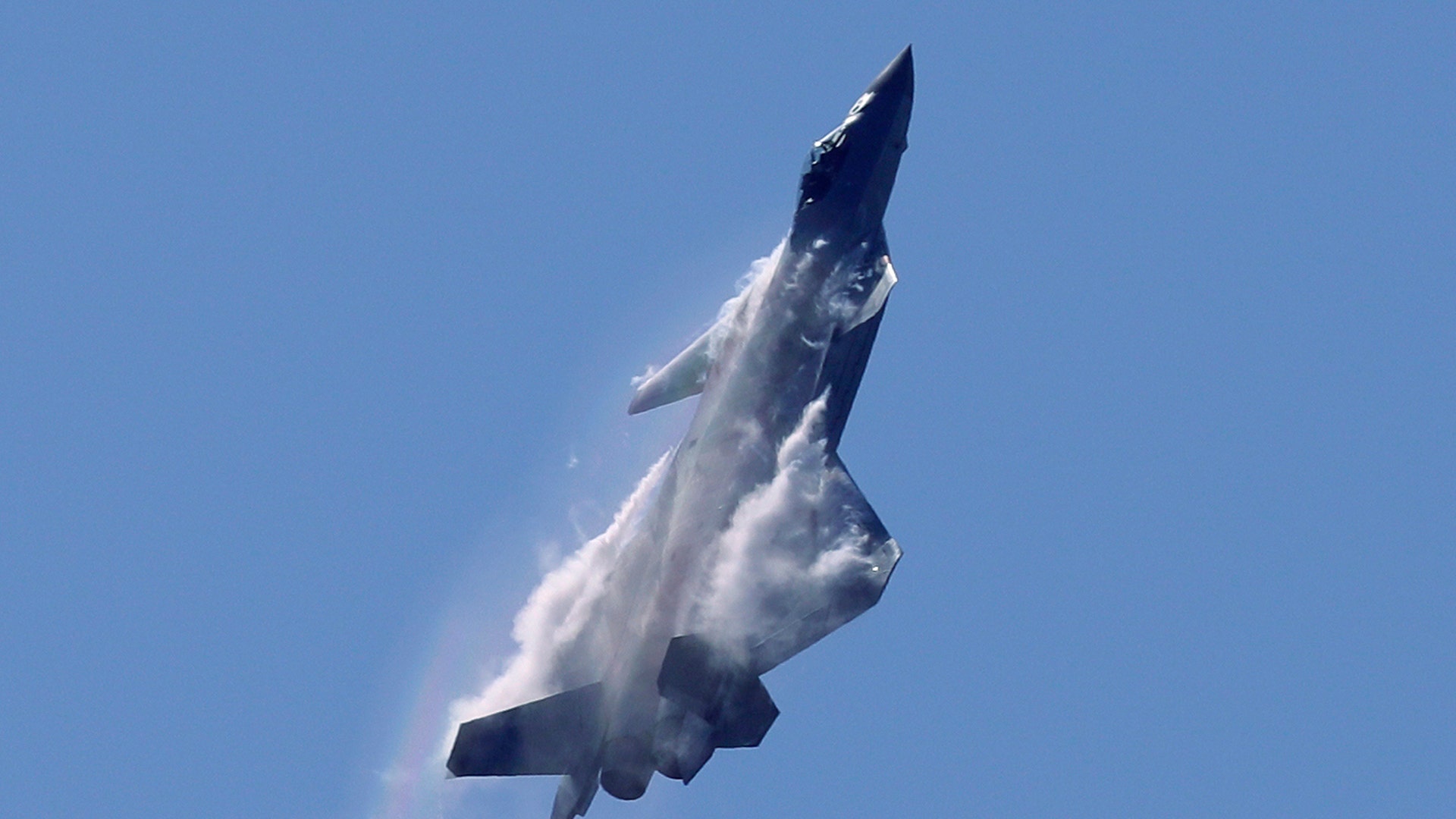 A J-20 stealth fighter jet of the Chinese People's Liberation Army Air Force performs during the 12th China International Aviation and Aerospace Exhibition in Zhuhai city, south China's Guangdong province, November 6, 2018. 