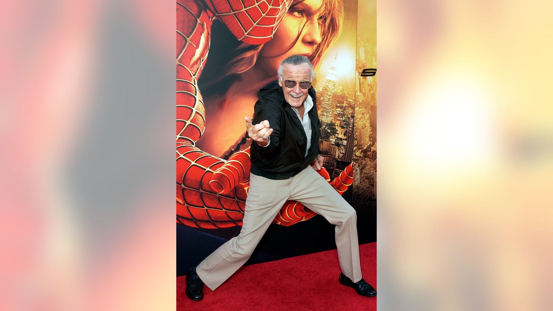 FILE - In this June 22, 2004 photo, Spiderman creator and "Spider-Man 2" executive producer Stan Lee poses for photographers at the premiere of "Spider-Man 2" in Los Angeles. "I think everybody loves things that are bigger than life. ... I think of them as fairy tales for grown-ups," he told The Associated Press in a 2006 interview.