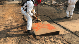 The Latest: Residents who fled flames return for memorial