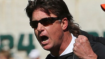 Oklahoma State’s Mike Gundy inks lifetime contract with Cowboys