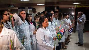 Cuban doctors land in Havana after program ends with Brazil