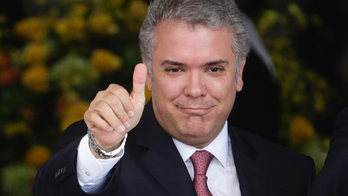 Colombia president snagged by protests, congressional revolt