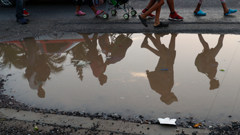 The Latest: Guatemala president to visit US