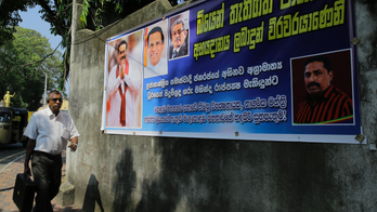 Chaotic Sri Lankan Parliament rejects president's chosen PM