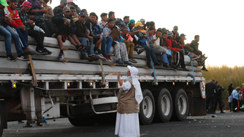 Splintered migrant caravan groups arrive at US border