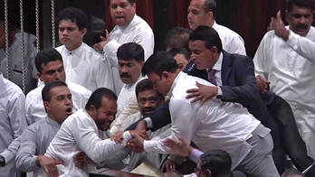 Sri Lankan lawmakers fight in Parliament over PM dispute