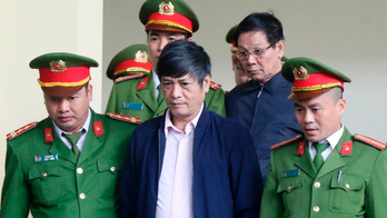 Vietnam jails 2 ex-police generals for role in gambling ring