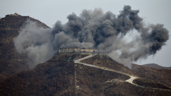 South Korea dismantles guard posts with dynamite, excavators