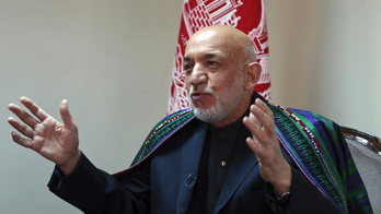 AP Interview: Karzai welcomes Gitmo 5 into peace discussion