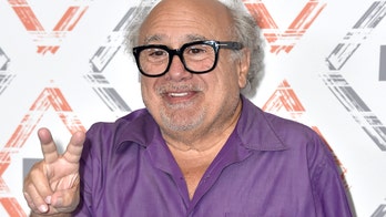 Shrine to Danny DeVito found behind college restroom's towel dispenser