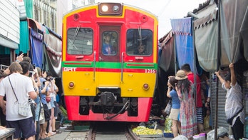 Instagram star slammed for 'dangerous' photo in front of moving train