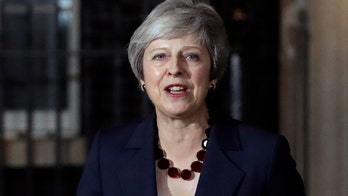 May says UK Cabinet backs Brexit deal amid wide opposition