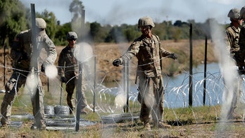 Mexican police find 20 bodies, most burned, close to US border