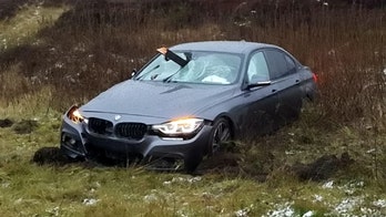 Car impaled by wood post in crash, missing driver by inches