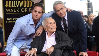 Kirk Douglas, 102, poses for family photo featuring four generations: ‘Family first’