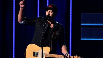 Luke Bryan shows off his dance moves during the CMA Awards
