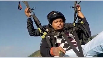 Paraglider pilot dies saving his passenger's life after cord snaps midair
