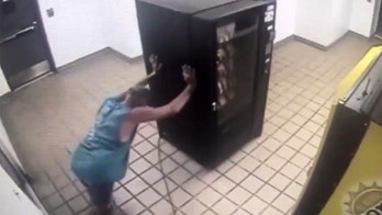 Video shows Florida burglar taking vending machine for a ride in elevator