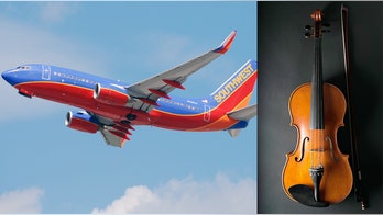 Violinist claims Southwest Airlines forced him to leave flight after he refused to check $80,000 instrument
