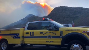 Fires scorch area near Southern California mass shooting, force evacuation of 30,000 residents