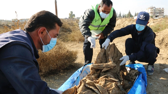 Hundreds of bodies exhumed from mass grave in Syria's Raqqa