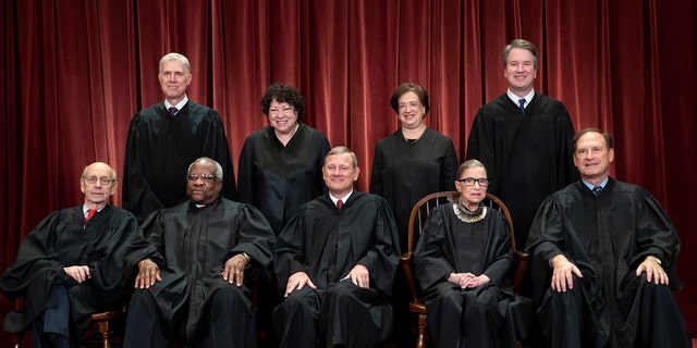 The judges of the US Supreme Court gather for a formal group portrait, which includes the new associate justice, top row, far right, in the Supreme Court Building in Washington, Friday, November 30, 2018. Seated from left: Associate Justice Stephen Breyer, Associate Attorney Clarence Thomas, U.S. Supreme Court Justice John G. Roberts, Attorney General Ruth Bader Ginsburg, and Attorney General Samuel Alito Jr.  Standing back from left: Assistant Attorney Neil Gorsuch, Assistant Attorney Sonia Sotomayor, Assistant Attorney Elena Kagan and Assistant Attorney Judge Brett M. Kavanaugh.  (AP Photo / J. Scott Applewhite)