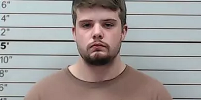 Hunter Newman, 22, allegedly hit a 9-year-old boy who was crossing a street to board a school bus.