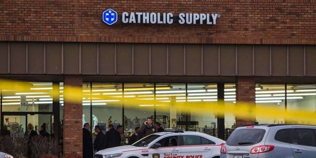 Authorities investigated the scene in a Catholic supply store. An armed man went to the religious supplies store, sexually assaulted at least one woman and shot a woman in the head.