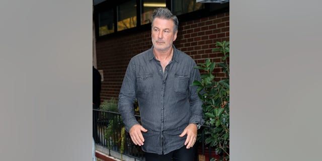 Alec Baldwin leaving NYPD's 6th precinct on Friday.