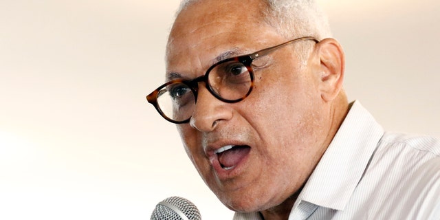Mike Espy, a former congressman and former U.S. agriculture secretary, speaks at the Neshoba County Fair, one of Mississippi's largest political events. (AP Photo/Rogelio V. Solis, File)
