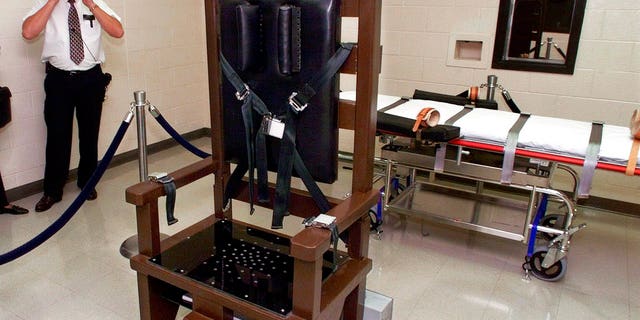 FILE: Ricky Bell, the warden at Riverbend Maximum Security Institution in Nashville, Tenn., gives a tour of the prison's execution chamber.