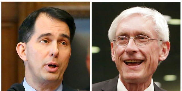 Former Wisconsin Gov. Scott Walker, left, a Republican, sent the state's National Guard troops to the southern border but his Democratic successor, Tony Evers, withdrew them. (Associated Press)