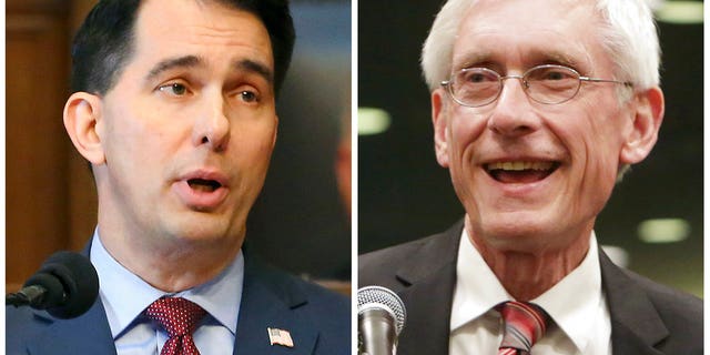 Former Wisconsin Gov. Scott Walker, left, a Republican, sent the state's National Guard troops to the southern border but his Democratic successor, Tony Evers, withdrew them. (Associated Press)