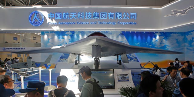 China's new-generation stealth unmanned combat aircraft prototype, the CH-7, is displayed during the 12th China International Aviation and Aerospace Exhibition. (AP Photo/Kin Cheung, File)