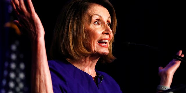 House Democratic Leader Nancy Pelosi of Calif., speaks to a crowd of volunteers and supporters of the Democratic party at an election night returns event at the Hyatt Regency Hotel, on Tuesday, Nov. 6, 2018, in Washington. (AP Photo/Jacquelyn Martin)