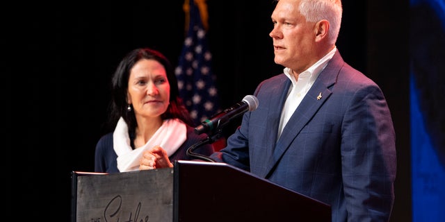 Rep. Pete Sessions, R-Texas, is joined by his wife Karen on stage after conceding defeat on election night 2018.
