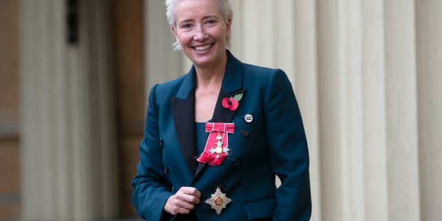 Emma Thompson stands outside Buckingham Palace, London, after being made a Dame Commander of the British Empire by Prince William on Wednesday Nov. 7, 2018.