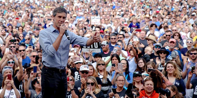 FILE - In this Nov. 4, 2018, file photo, Beto O'Rourke, the 2018 Democratic candidate for U.S. Senate in Texas, gives the thumbs up as he takes the stage to speak at the Pan American Neighborhood Park in Austin, Texas. O'Rourke didn't turn Texas blue, but for the first time in decades, it's looking much less red. Texas has long been a laboratory of conservatism. But cracks in the GOP's supremacy are emerging. The results could reverberate nationally. (Nick Wagner/Austin American-Statesman via AP, File)
