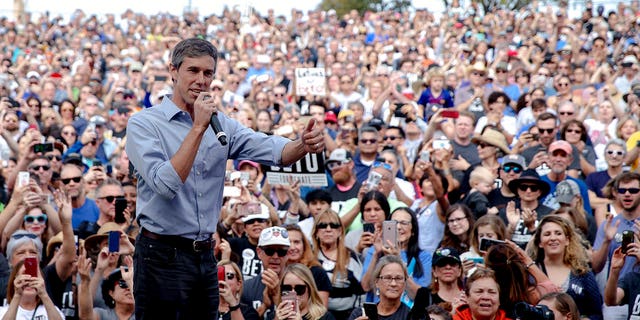 FILE - In this Nov. 4, 2018, file photo, Beto O'Rourke, the 2018 Democratic candidate for U.S. Senate in Texas, gives the thumbs up as he takes the stage to speak at the Pan American Neighborhood Park in Austin, Texas. O'Rourke didn't turn Texas blue, but for the first time in decades, it's looking much less red. Texas has long been a laboratory of conservatism. But cracks in the GOP's supremacy are emerging. The results could reverberate nationally. (Nick Wagner/Austin American-Statesman via AP, File)