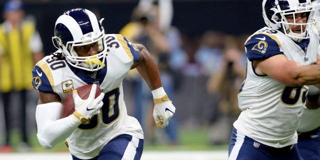Los Angeles Rams running back Todd Gurley (30) carries for a touchdown in the first half of an NFL football game against the New Orleans Saints in New Orleans, Sunday, Nov. 4, 2018.