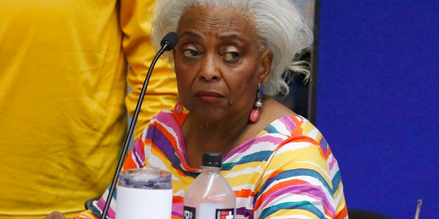Brenda Snipes, Broward County supervisor of elections, speaks with officials before a canvassing board meeting Friday, Nov. 9, 2018, in Lauderhill, Fla. (AP Photo/Joe Skipper)