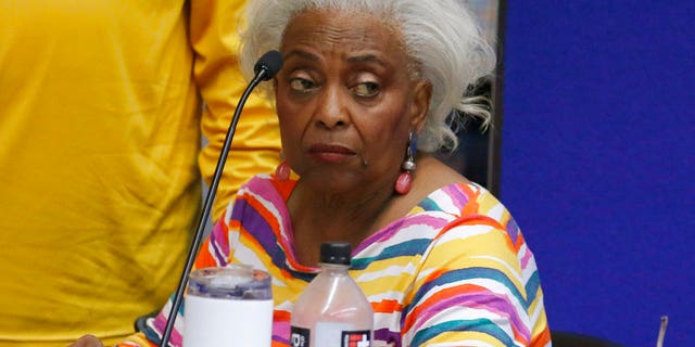 Brenda Snipes, Broward County supervisor of elections, speaks with officials before a canvasing board meeting Friday, Nov. 9, 2018, in Lauderhill, Fla. (AP Photo/Joe Skipper)